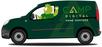 Green Van With &Quot;Camp Digital Home Services&Quot; Logo On The Side. A Cartoon Animal Driver Waves From The Window.