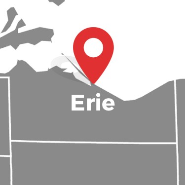 A Map Highlights Erie With A Red Location Pin, Detailly Marking Its Position Within The Service Area.