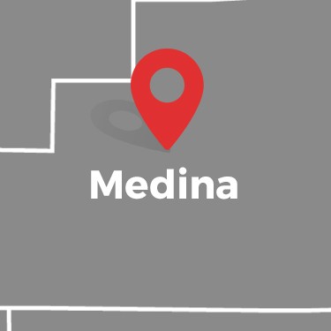 A Map Highlighting Medina With A Red Location Pin On A Gray Background Marks The Service Area.